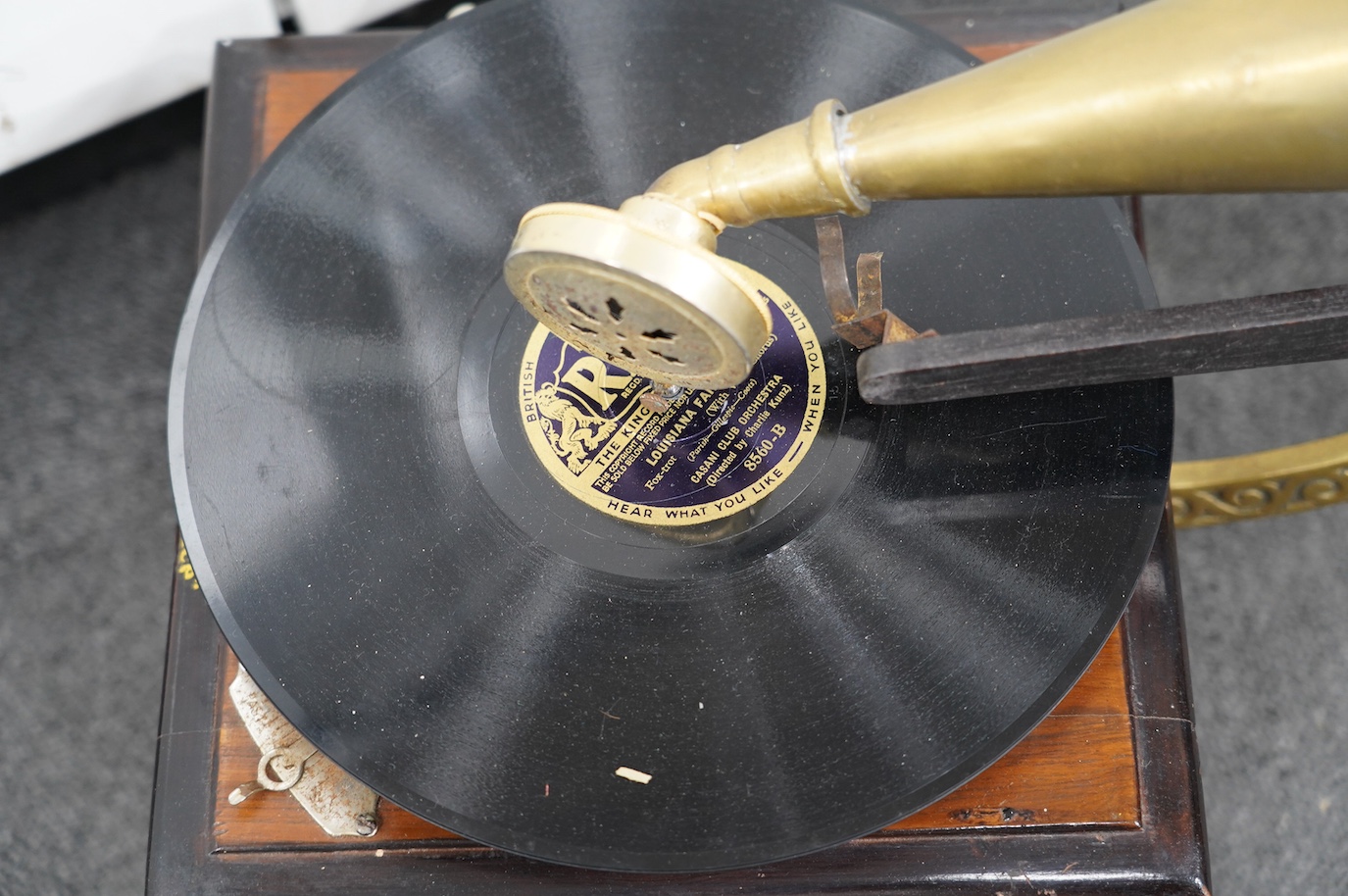 An early 20th century ‘His Masters Voice’ mahogany and ebonised gramophone with brass horn, base 29 x 29cm. Condition - fair